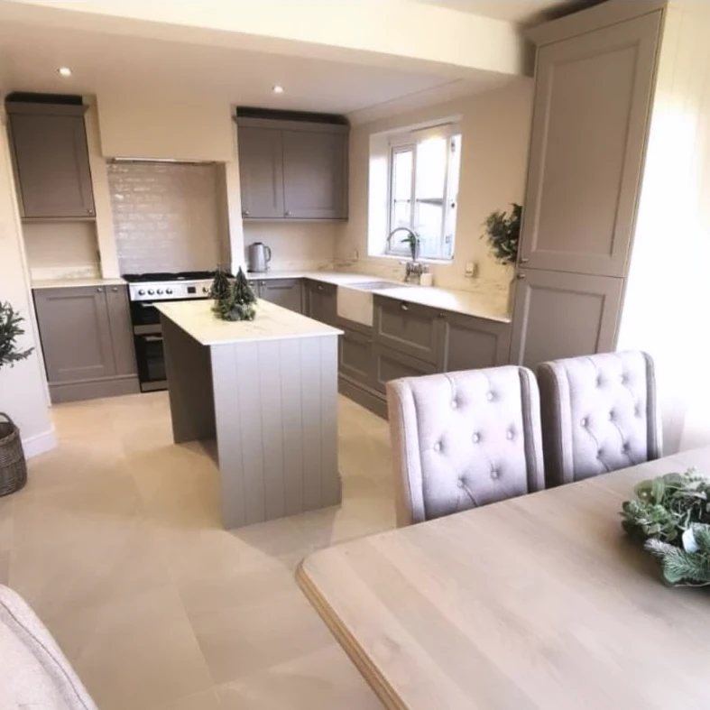 Grey shaker kitchen with tall larder unit and island